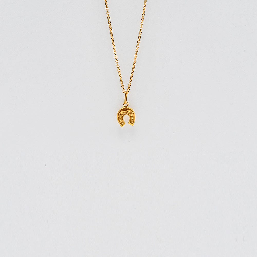 luisa-paix-o-ferradura-charm-fer-cheval-argent-dor image 1