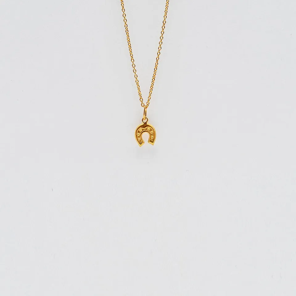luisa-paix-o-ferradura-charm-fer-cheval-argent-dor image 1